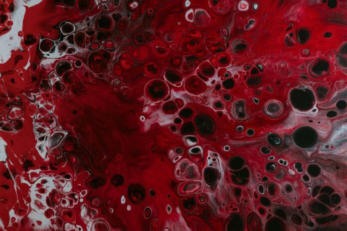 a red and black painting with lots of bubbles